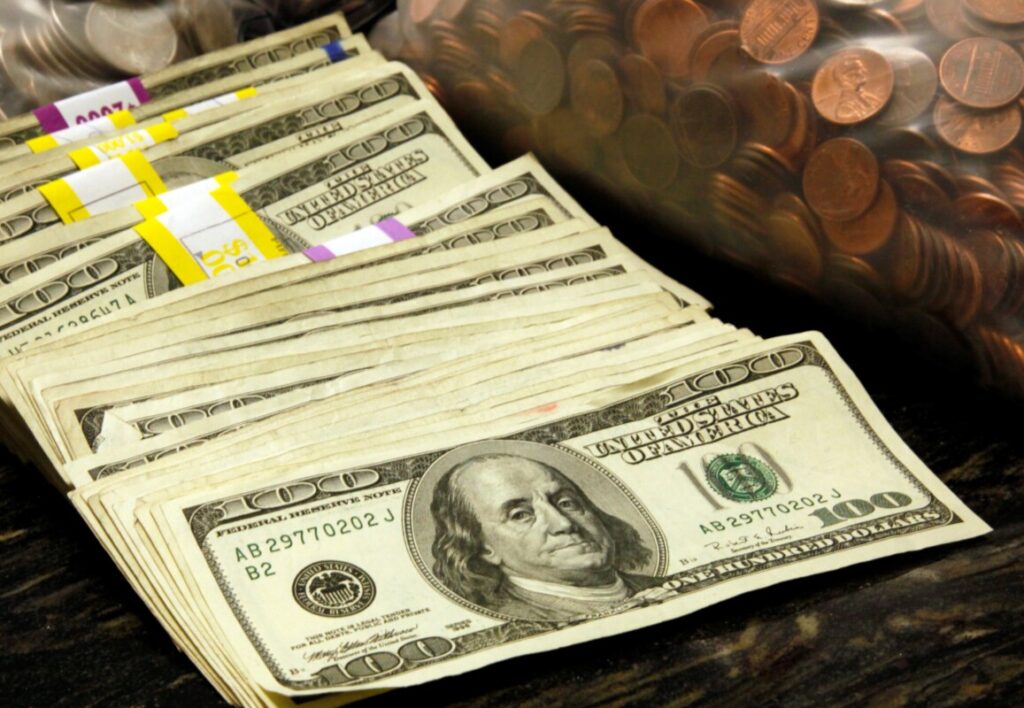 Cédulas e moedas de dólar
